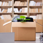 Box-of-Office-Items-on-Desk